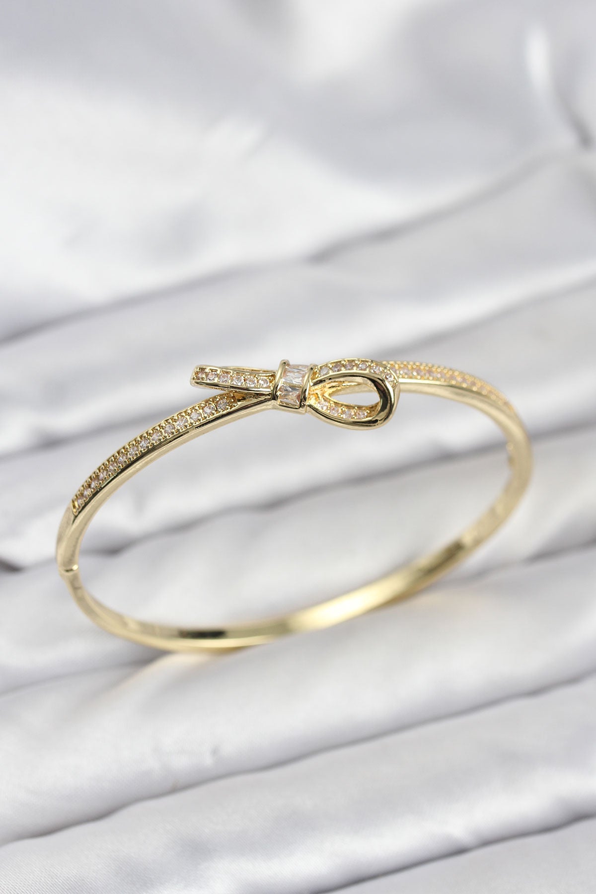 Brass Gold-Tone Bow Bangle Bracelet with Zircon Detail