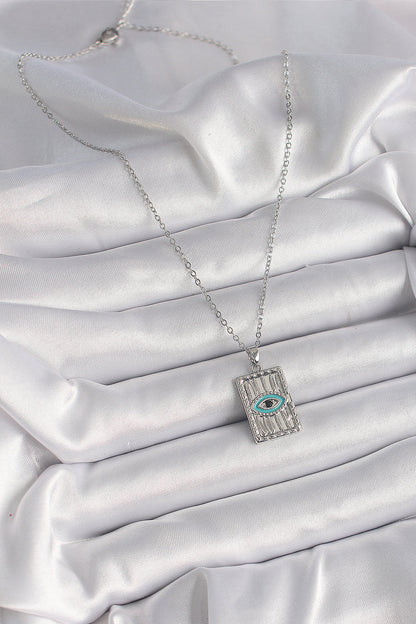 316L Çelik Gümüş Renk Zirkon Taşlı Göz İşleme Detaylı Plaka Model Kadın Kolye