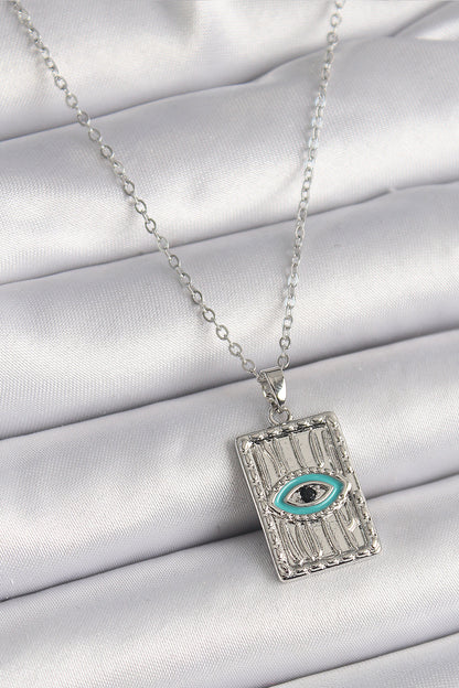 316L Çelik Gümüş Renk Zirkon Taşlı Göz İşleme Detaylı Plaka Model Kadın Kolye