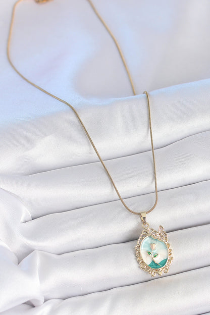 316L Çelik Gold Renk Zincir Mavi Mineli Çiçek İşlemeli Zirkon Taş Detaylı Portre Model Kadın Kolye