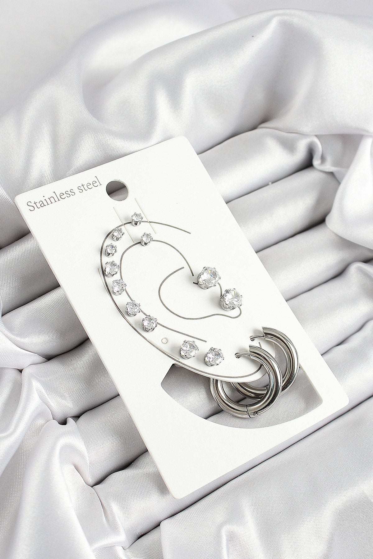 316L Çelik Halka Figürlü Ve Zirkon Taşlı Gümüş Renk 7'li Çift Kadın Küpe Set