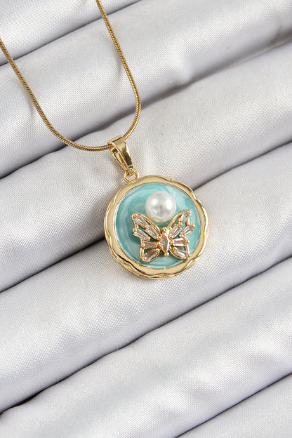 316L Çelik Zincir Zirkon Taşlı Turkuaz Sanatsal Portre İnci Detaylı Kelebek Model Gold Renk Kadın Kolye